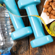 thumbnail image of water bottle, dumbbells and almonds