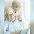 Thumbnail image of an elderly couple reading a book