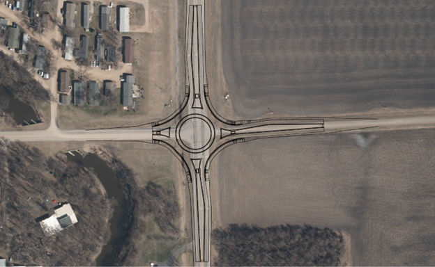 Aerial photo showing an overlay of a roundabout intersection at the intersection of county highway 17 and 64th avenue south