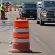 Thumbnail image showing a construction zone with construction cones and workers