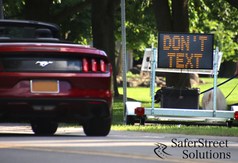 SmartSign Example on the side of a road telling the driver Don't Text