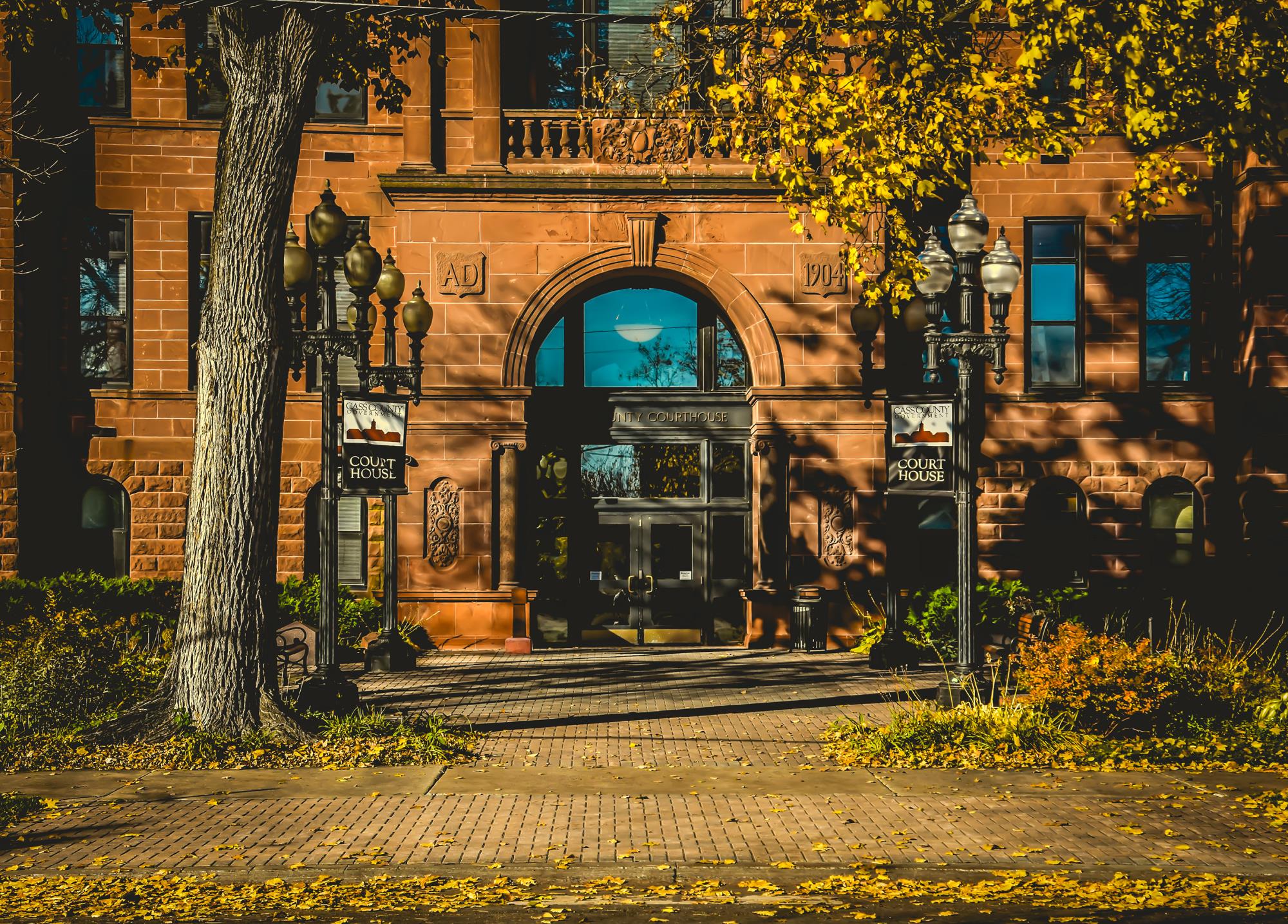 Photo of the front entrance to the Cass County Courthouse on a sunny fall day.