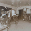 Image of the U R Next barbershop as it was in the early 1900s