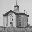 Thumbnail image of the first courthouse built in Cass County in 1874